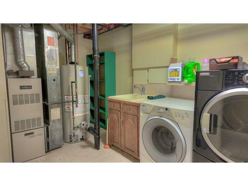 319 Silvertip Close, Canmore, AB - Indoor Photo Showing Laundry Room