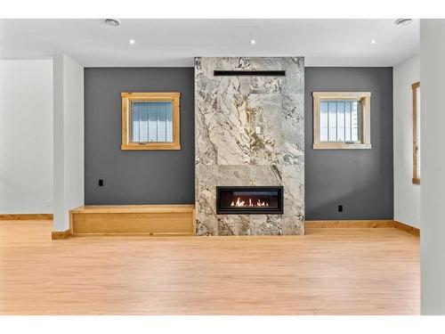 236 Stewart Creek Rise, Canmore, AB - Indoor With Fireplace