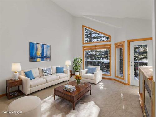 4-833 7Th Street, Canmore, AB - Indoor Photo Showing Living Room