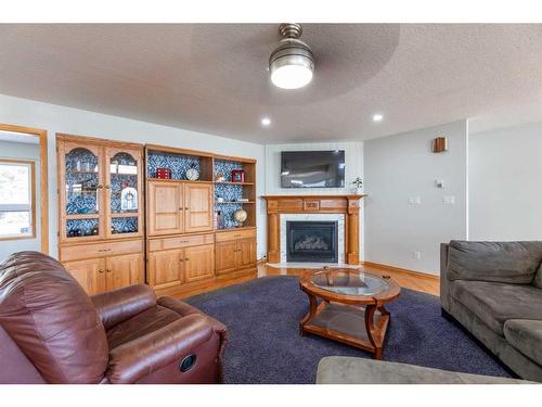 15 Maskuta Estates, Rural Yellowhead County, AB - Indoor Photo Showing Living Room With Fireplace