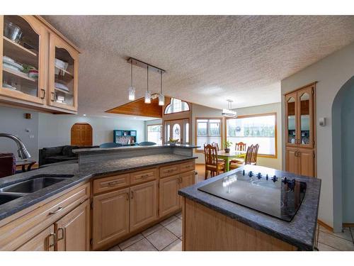 15 Maskuta Estates, Rural Yellowhead County, AB - Indoor Photo Showing Kitchen With Double Sink