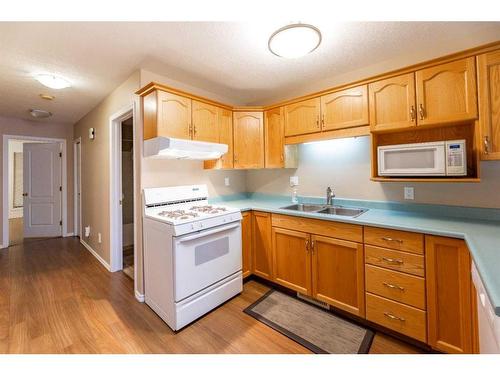 170 Sitar Crescent, Hinton, AB - Indoor Photo Showing Kitchen With Double Sink