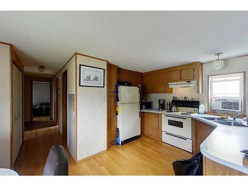 2756 Strawberry Lane, Wabasca, AB - Indoor Photo Showing Kitchen With Double Sink