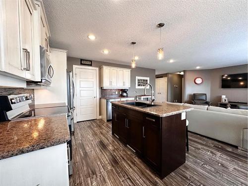 47 Riverstone Road, Whitecourt, AB - Indoor Photo Showing Kitchen With Double Sink With Upgraded Kitchen