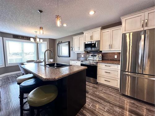 47 Riverstone Road, Whitecourt, AB - Indoor Photo Showing Kitchen With Double Sink