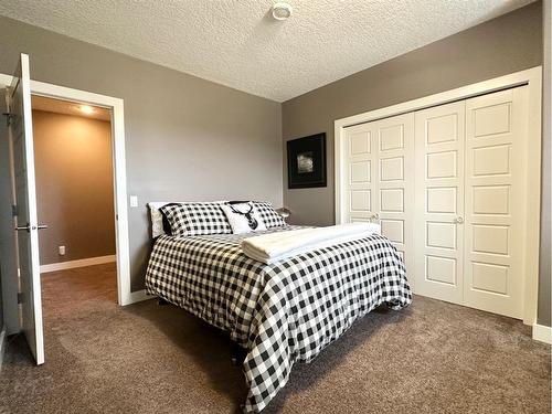 47 Riverstone Road, Whitecourt, AB - Indoor Photo Showing Bedroom