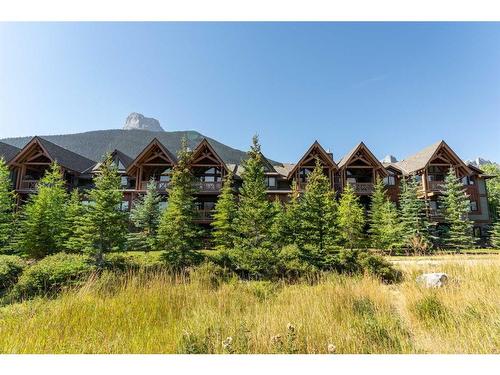 316-106 Stewart Creek Landing, Canmore, AB - Outdoor With Facade