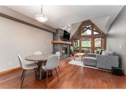 316-106 Stewart Creek Landing, Canmore, AB - Indoor With Fireplace