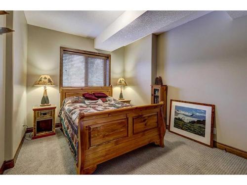 220 Miskow Close, Canmore, AB - Indoor Photo Showing Bedroom