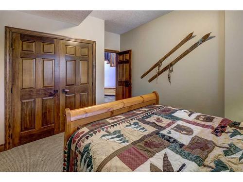 220 Miskow Close, Canmore, AB - Indoor Photo Showing Bedroom