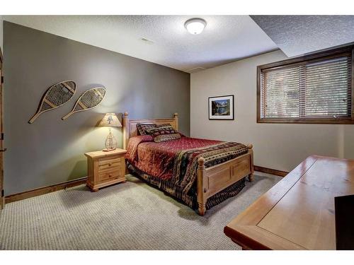 220 Miskow Close, Canmore, AB - Indoor Photo Showing Bedroom