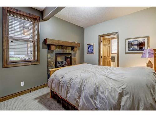 220 Miskow Close, Canmore, AB - Indoor Photo Showing Bedroom