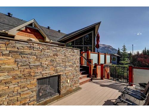 220 Miskow Close, Canmore, AB - Outdoor With Fireplace With Exterior