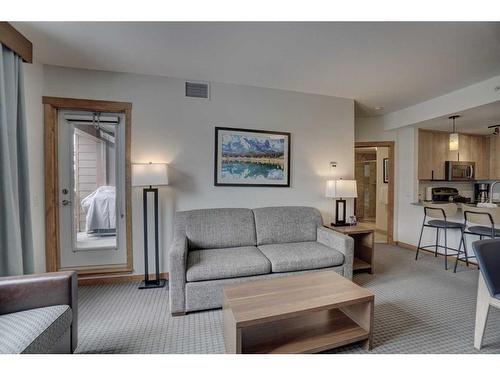 213-190 Kananaskis Way, Canmore, AB - Indoor Photo Showing Living Room