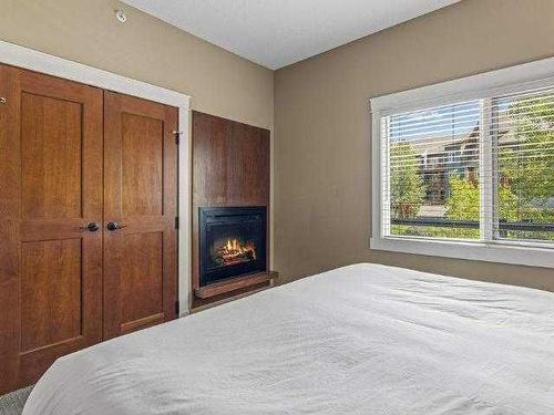 224-173 Kananaskis Way, Canmore, AB - Indoor Photo Showing Bedroom