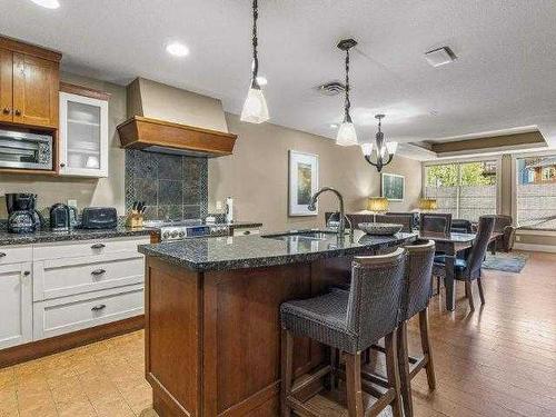 224-173 Kananaskis Way, Canmore, AB - Indoor Photo Showing Kitchen With Upgraded Kitchen