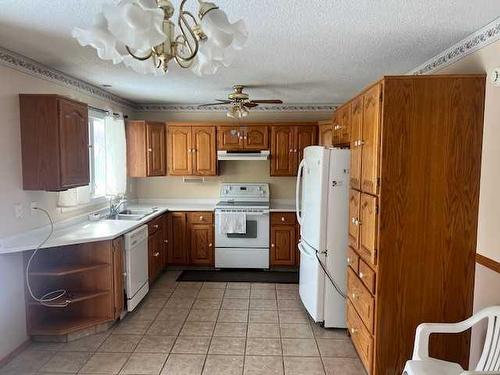 10530 106 Street, Grande Cache, AB - Indoor Photo Showing Kitchen With Double Sink