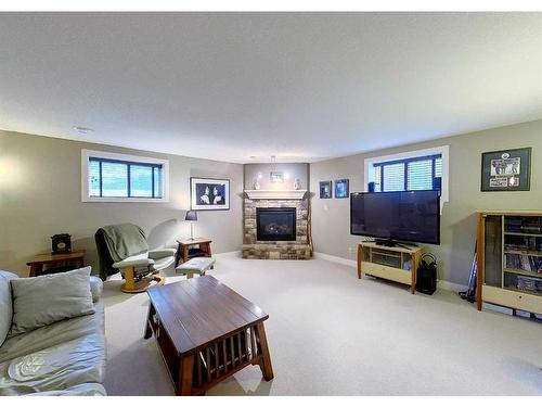 910 62 Street, Edson, AB - Indoor Photo Showing Living Room With Fireplace