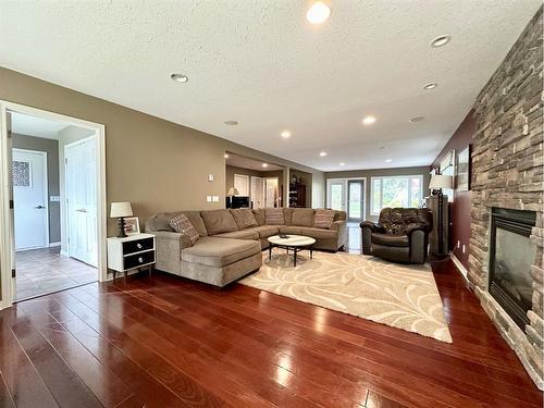 62 Baxter Crescent, Whitecourt, AB - Indoor Photo Showing Living Room With Fireplace