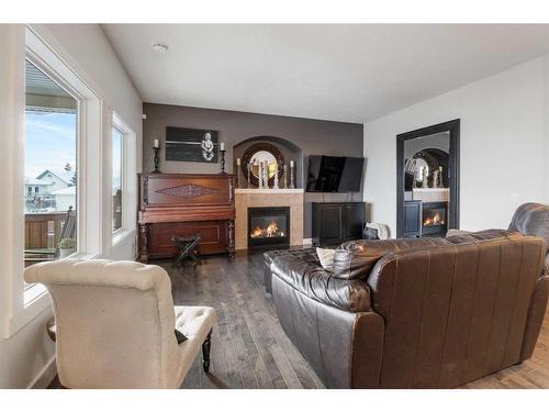 131 Mink Creek Road, Whitecourt, AB - Indoor Photo Showing Living Room With Fireplace