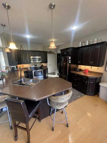 11-120053 Township Road 584, Rural Woodlands County, AB - Indoor Photo Showing Kitchen With Double Sink