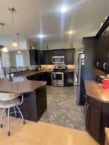 11-120053 Township Road 584, Rural Woodlands County, AB - Indoor Photo Showing Kitchen With Double Sink