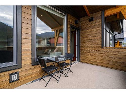 302H-209 Stewart Creek Rise, Canmore, AB - Outdoor With Deck Patio Veranda With Exterior