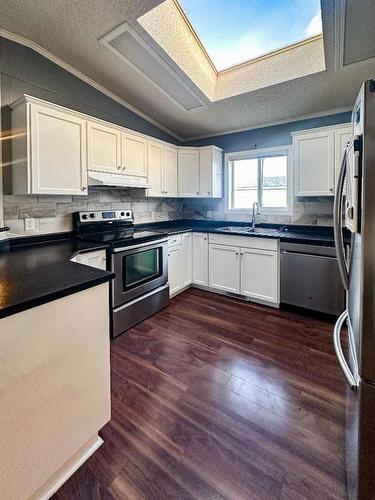 3 Karlzen Court, Whitecourt, AB - Indoor Photo Showing Kitchen With Double Sink