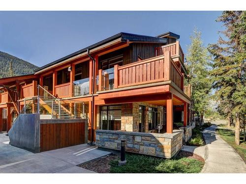 203-3000A Stewart Creek Drive, Canmore, AB - Outdoor With Deck Patio Veranda