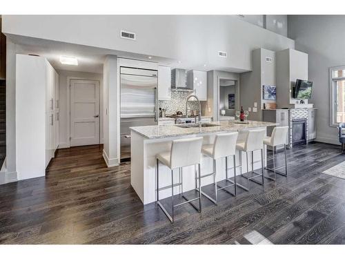 203-3000A Stewart Creek Drive, Canmore, AB - Indoor Photo Showing Kitchen With Upgraded Kitchen