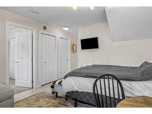 206-201 Muskrat Street, Banff, AB - Indoor Photo Showing Bedroom