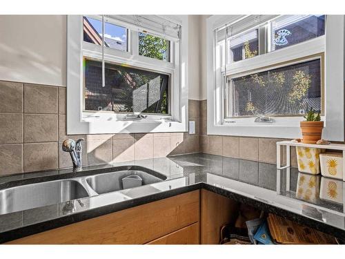 206-201 Muskrat Street, Banff, AB - Indoor Photo Showing Kitchen With Double Sink