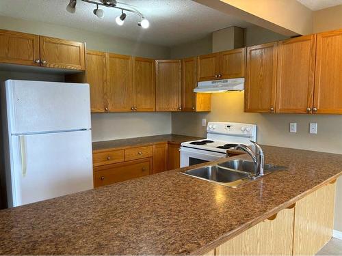 68 Wellwood Drive, Whitecourt, AB - Indoor Photo Showing Kitchen With Double Sink