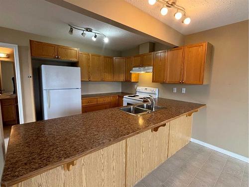 68 Wellwood Drive, Whitecourt, AB - Indoor Photo Showing Kitchen With Double Sink