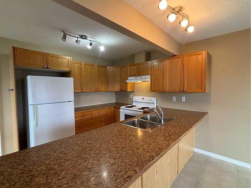 68 Wellwood Drive, Whitecourt, AB - Indoor Photo Showing Kitchen With Double Sink