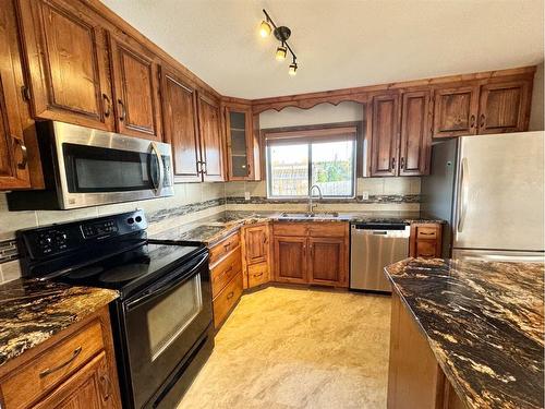 6 Isbister Avenue, Swan Hills, AB - Indoor Photo Showing Kitchen With Double Sink