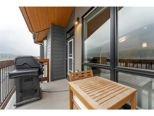 304-106 Stewart Creek Rise, Canmore, AB - Outdoor With Exterior