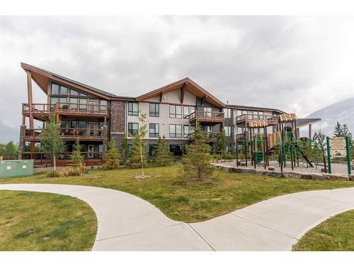 304-106 Stewart Creek Rise, Canmore, AB - Outdoor With Balcony