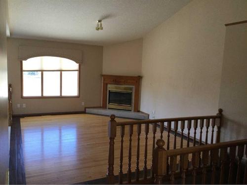 87 Park Drive, Whitecourt, AB - Indoor Photo Showing Other Room With Fireplace