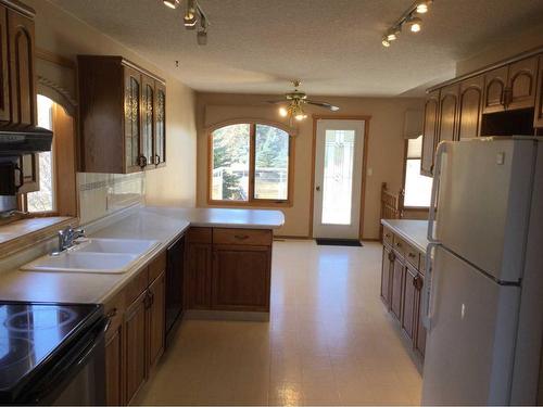 87 Park Drive, Whitecourt, AB - Indoor Photo Showing Kitchen With Double Sink