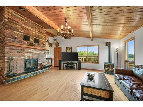 1 Spruce Hill Road, Rural Lesser Slave River No. 124, M.D. Of, AB - Indoor Photo Showing Living Room With Fireplace