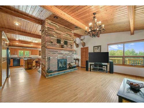 1 Spruce Hill Road, Rural Lesser Slave River No. 124, M.D. Of, AB - Indoor Photo Showing Living Room With Fireplace