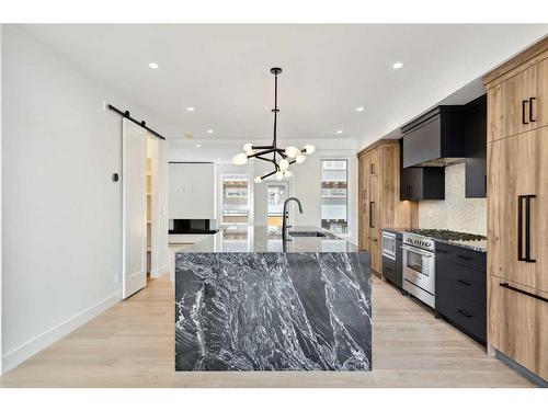 512 8Th Avenue, Canmore, AB - Indoor Photo Showing Kitchen With Upgraded Kitchen