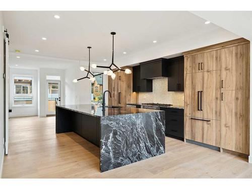 512 8Th Avenue, Canmore, AB - Indoor Photo Showing Kitchen With Upgraded Kitchen