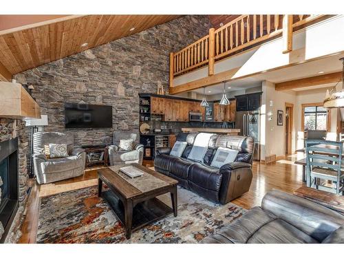 108-102 Armstrong Place, Canmore, AB - Indoor Photo Showing Living Room With Fireplace