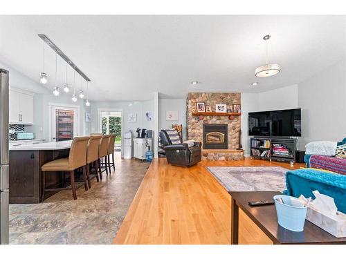 59 Ravine Drive, Whitecourt, AB - Indoor Photo Showing Living Room With Fireplace