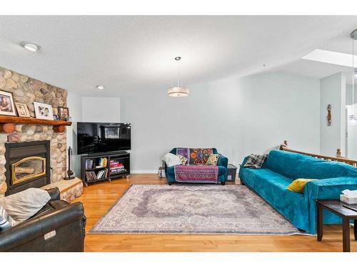 59 Ravine Drive, Whitecourt, AB - Indoor Photo Showing Living Room With Fireplace