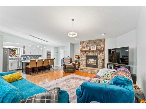 59 Ravine Drive, Whitecourt, AB - Indoor Photo Showing Living Room With Fireplace