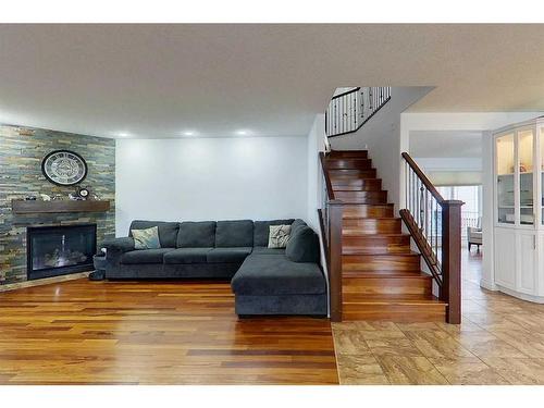 628 13 Street Se, Slave Lake, AB - Indoor Photo Showing Living Room With Fireplace