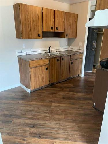 35-4513 52 Avenue, Whitecourt, AB - Indoor Photo Showing Kitchen With Double Sink